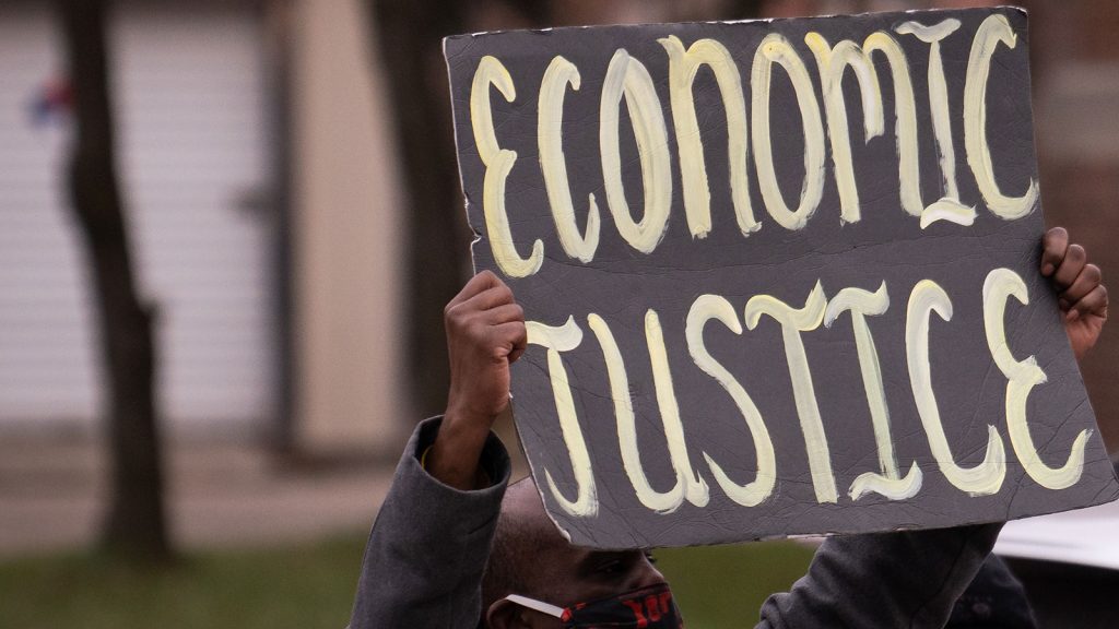 "Economic Justice" sign