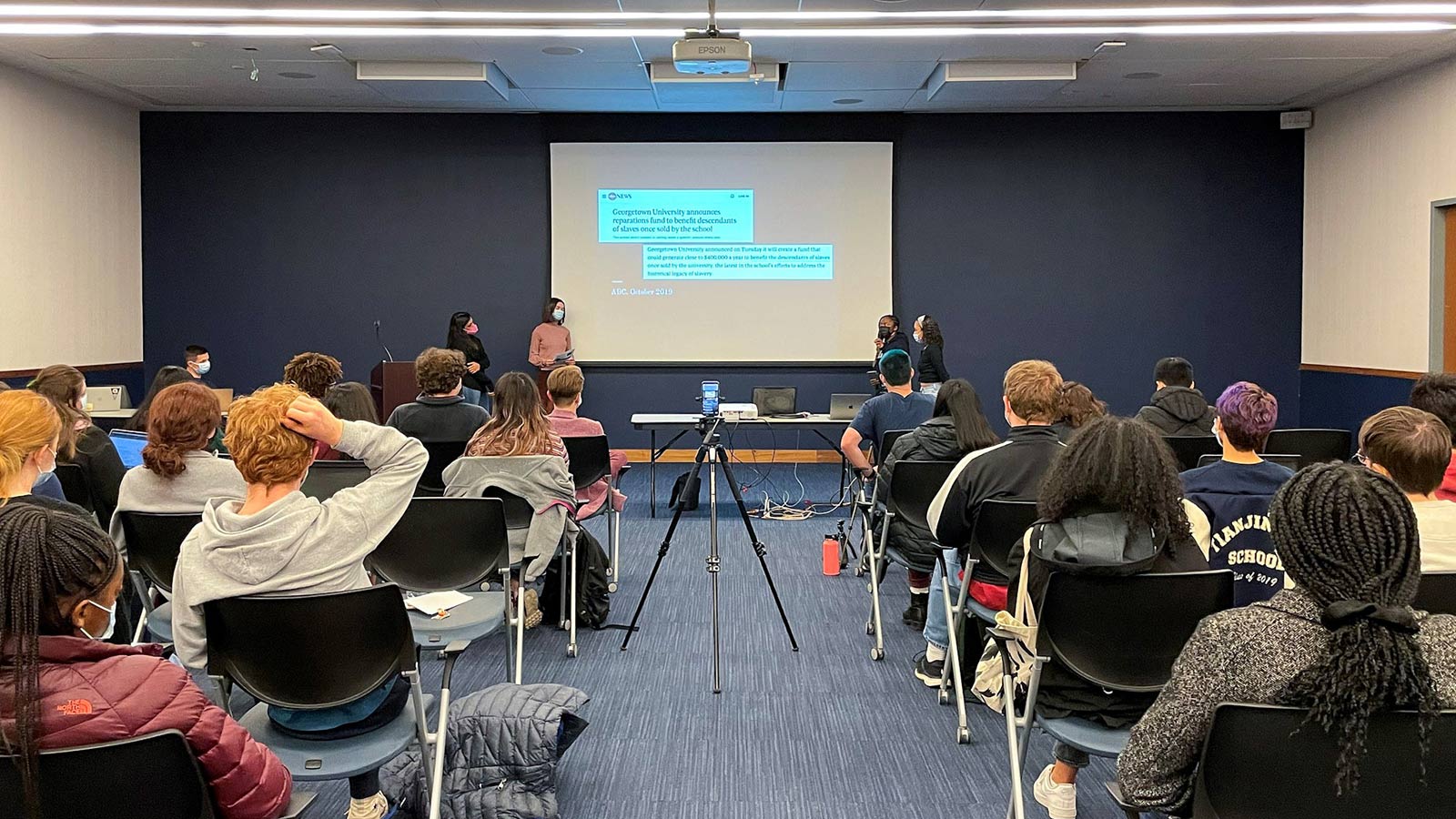Students at Georgetown University listen to a recent presentation about reparations for descendants of enslaved people. 