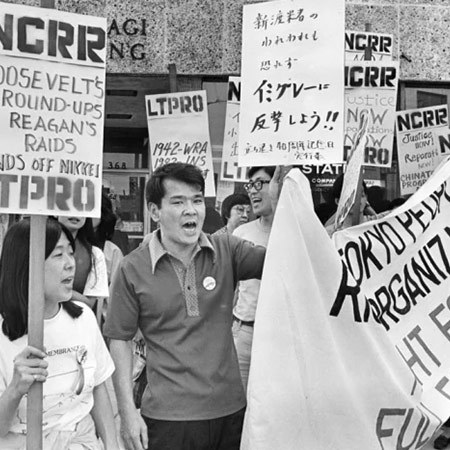 Kathy Masaoka, left, along with members of Nikkei for Civil Rights and Redress and Little Tokyo People's Rights Organization march for reparations in Los Angeles in the early 1980s.