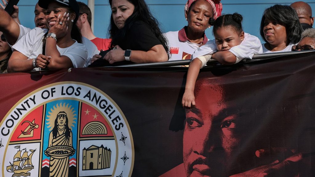 Angelenos celebrate during the 33rd Annual Martin Luther King Jr. Day parade in Los Angeles on Jan. 15, 2018. Thousands of people lined the streets of South Los Angeles for a Martin Luther King Jr. Day parade that is among the nation's biggest celebrations of the holiday.