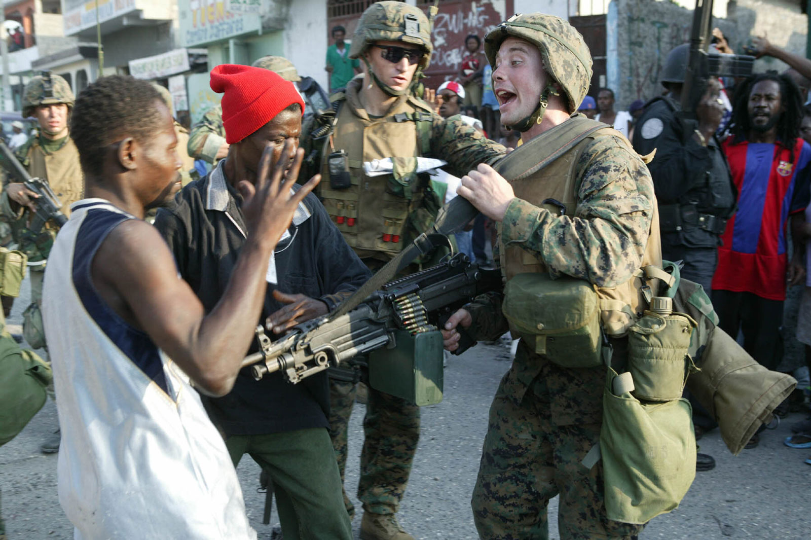 American Marines were confronted by supporters of Mr. Aristide days after he was ousted from power in 2004. 