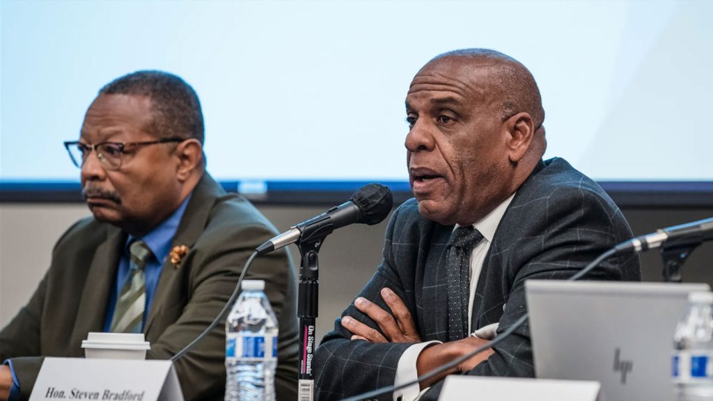 California State Senator Steven Bradford, right, speaks during a Reparations Task Force Meeting at San Diego State on Jan. 28, 2023.